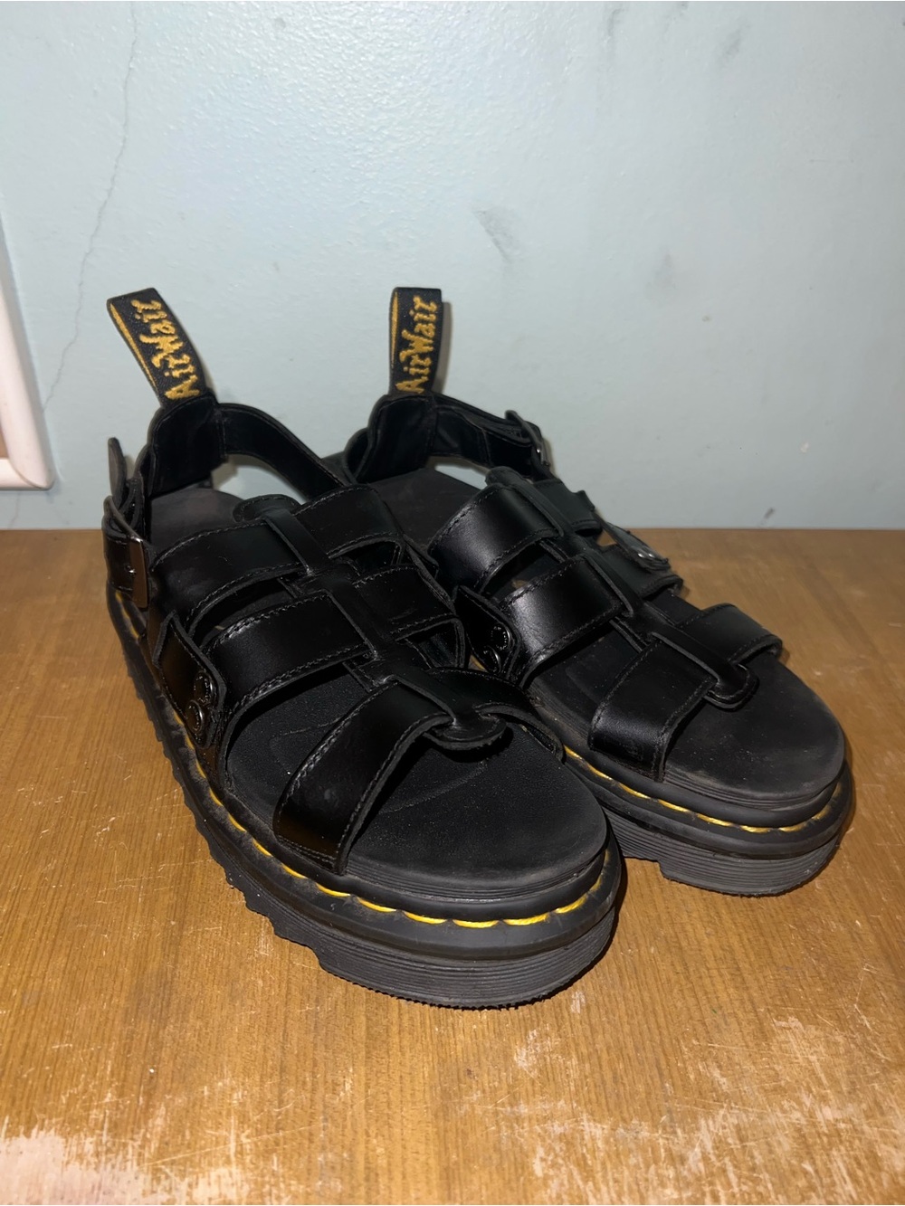 Dr. Martens Black Leather Platform Fisherman Sandals with Yellow Stitching